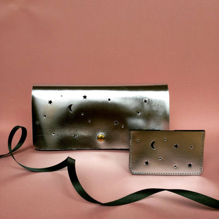 Silver leather wallet, metallic clutch with punched stars