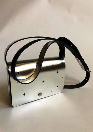 Leather purse in silver metallic with punched stars and moon